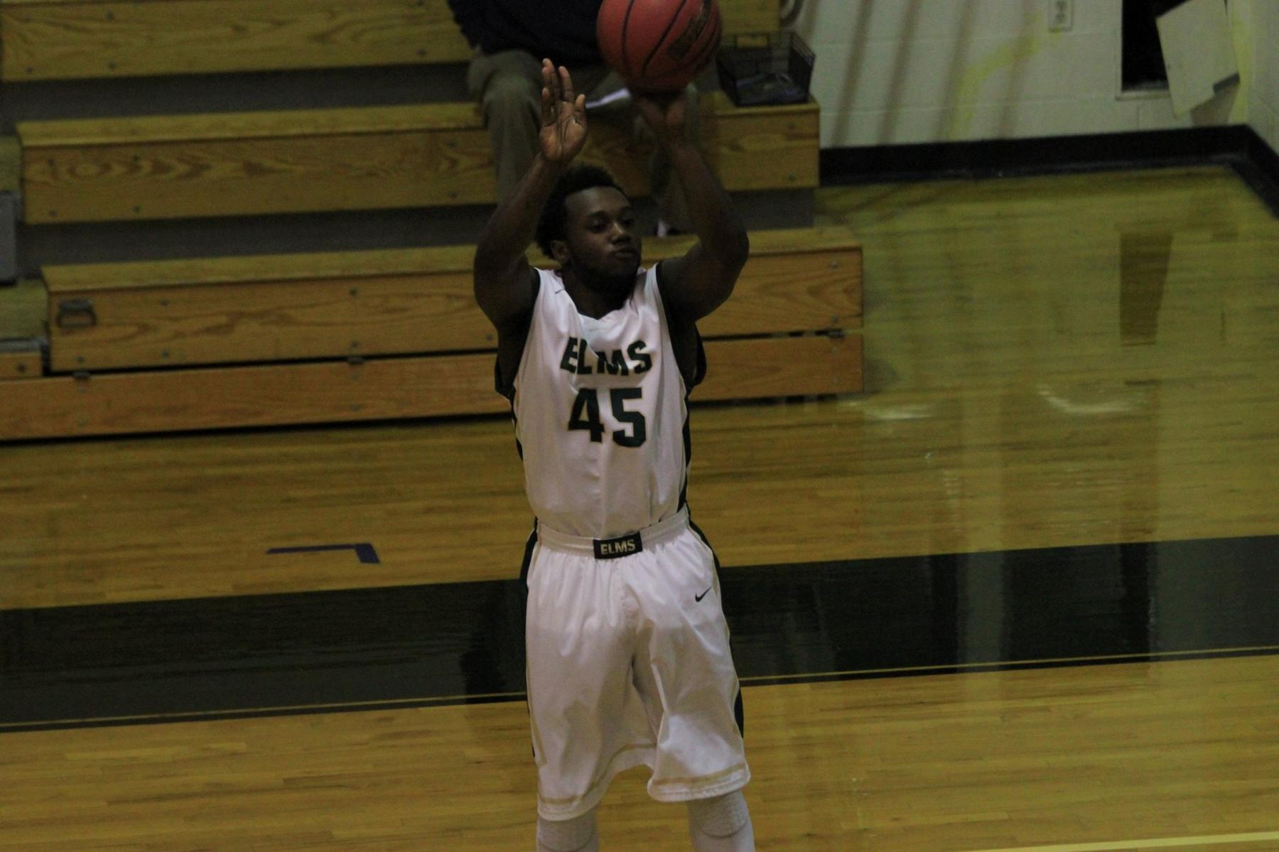 Men's Basketball Rolls Past Rhode Island College