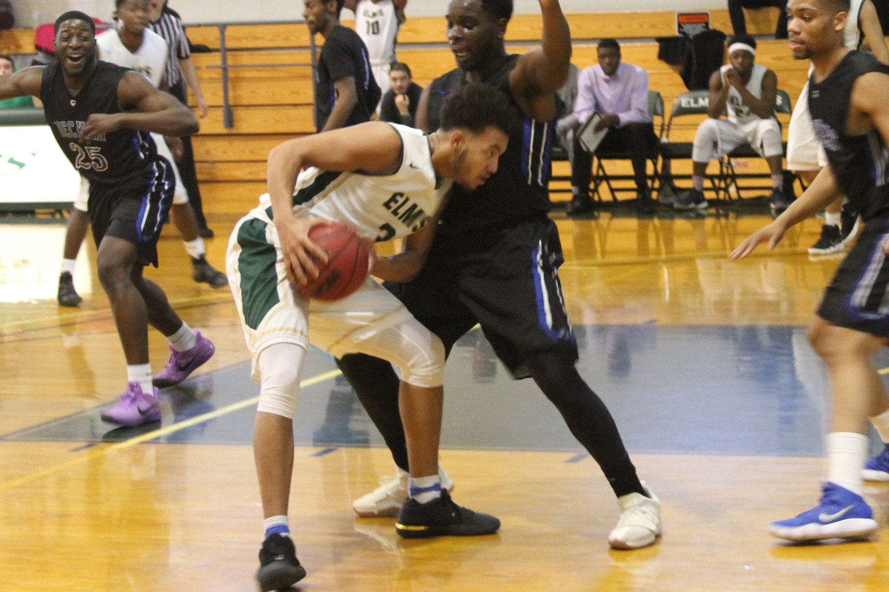Cold Shooting Halts Elms Men's Basketball At Dean