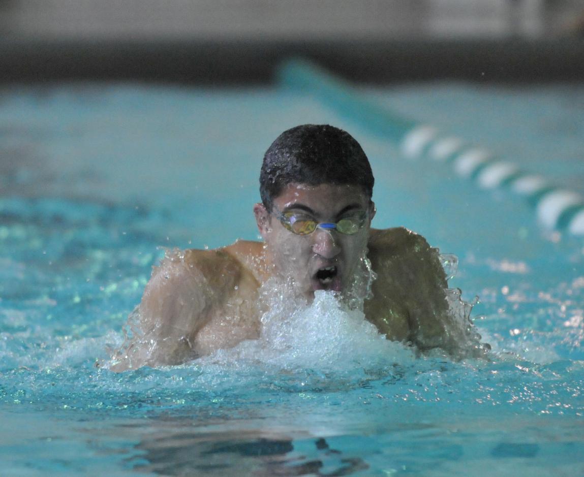 Etheridge Competes at ECAC Swimming Championships